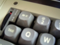 The Electra XT lacks a one key, instead placing a margin release key next to the two key.